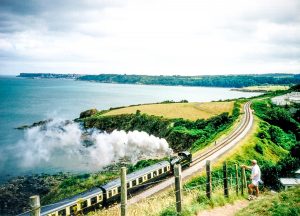 Steam Train and coastline near Grosvenor House Torquay in Devon